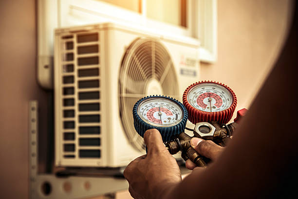 Professional Ac Installation technician working in Kalona, IA